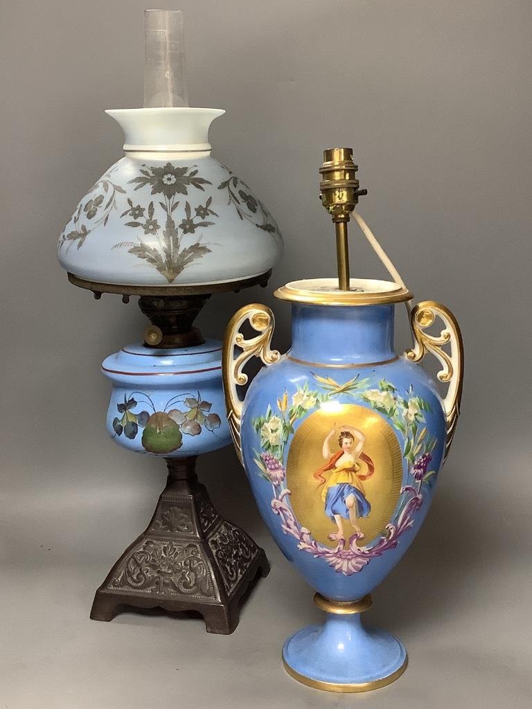 A French porcelain blue ground vase (converted to electricity) and a glass oil lamp